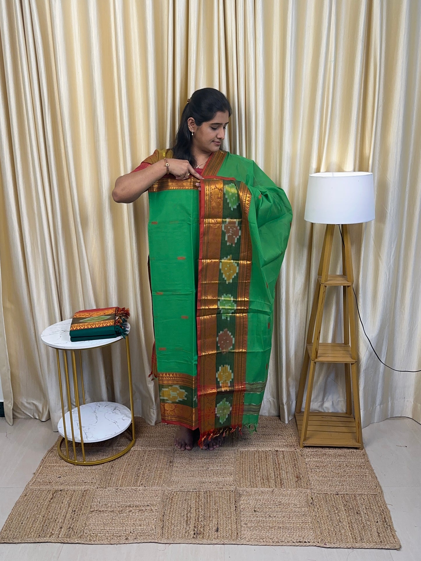 Light green Pochampalli border kanchi cotton