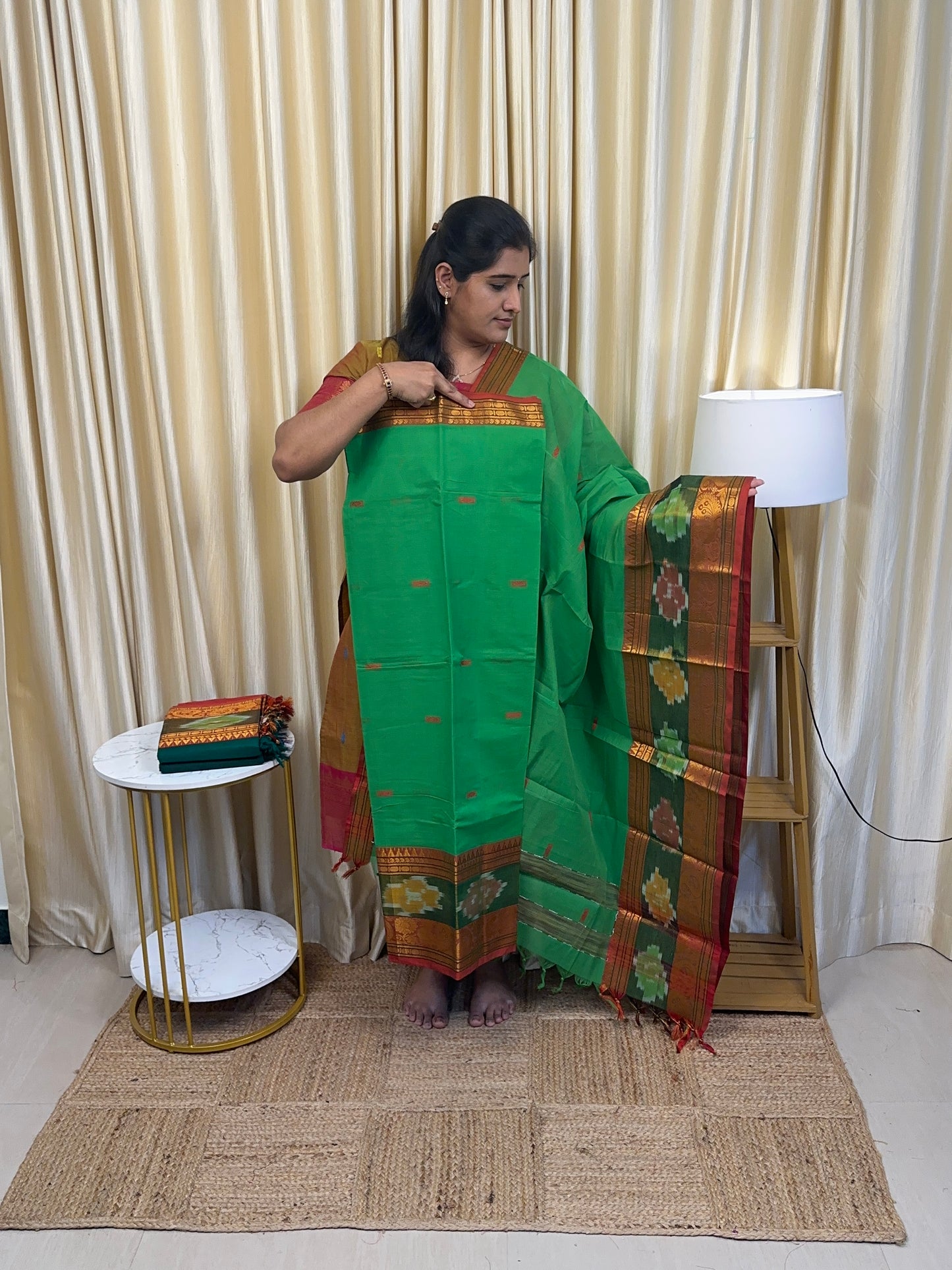 Light green Pochampalli border kanchi cotton